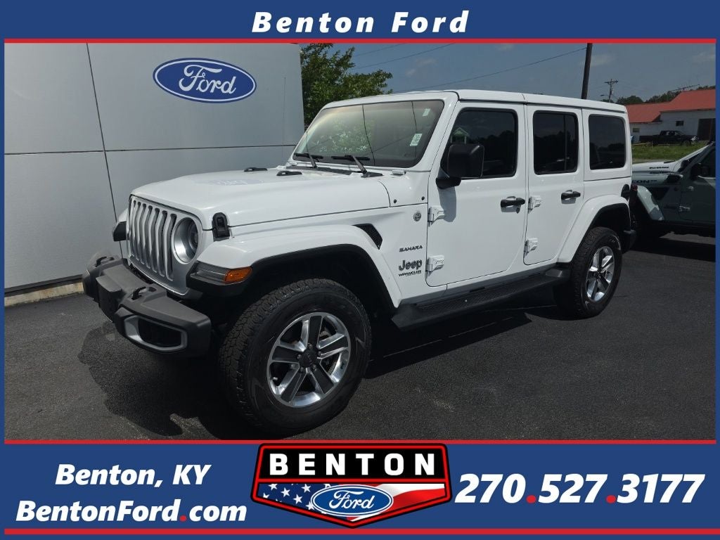 2022 Jeep Wrangler Unlimited Sahara in Bright White Clearcoat — front three-quarter view