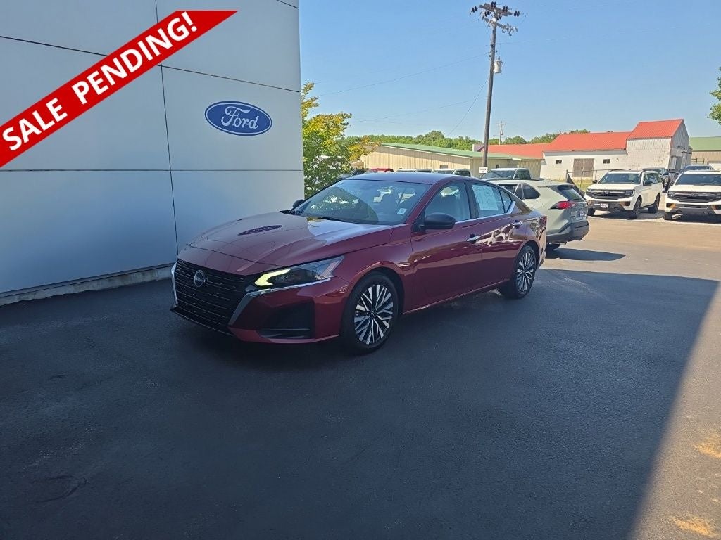 2025 Nissan Altima 2.5 SV in Scarlet Ember — front three-quarter view