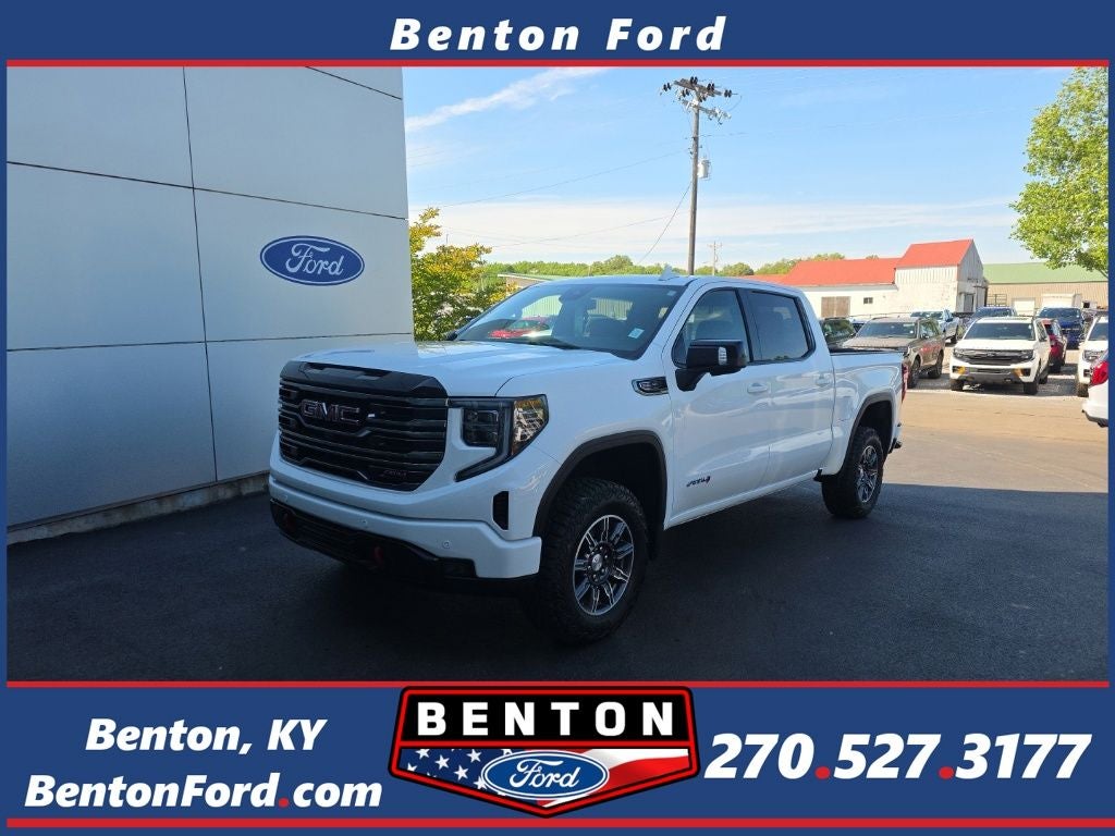 2025 GMC Sierra 1500 AT4 in Summit White — front three-quarter view