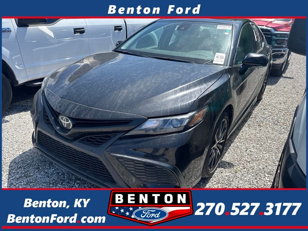 2024 Toyota Camry SE in Midnight Black Metallic — front three-quarter view